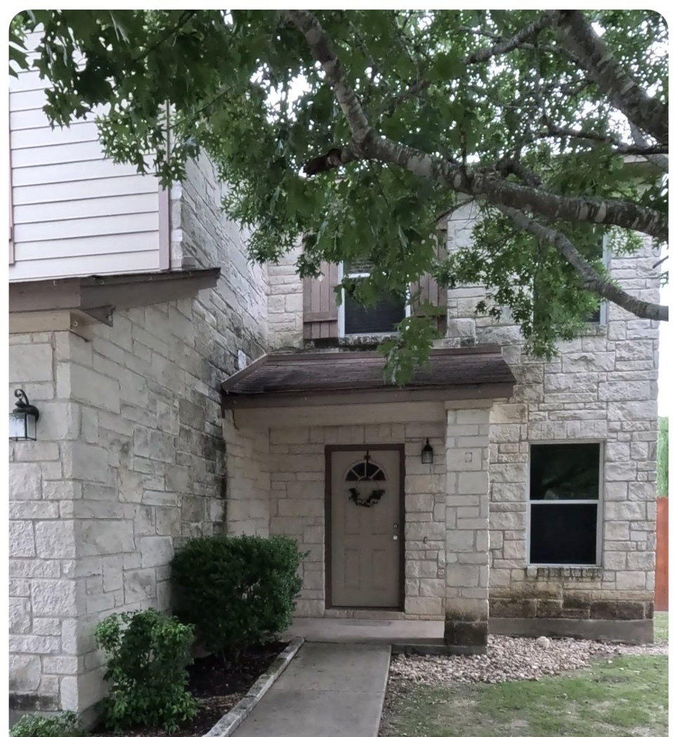 Stone House Soft Wash before ORION cleaning